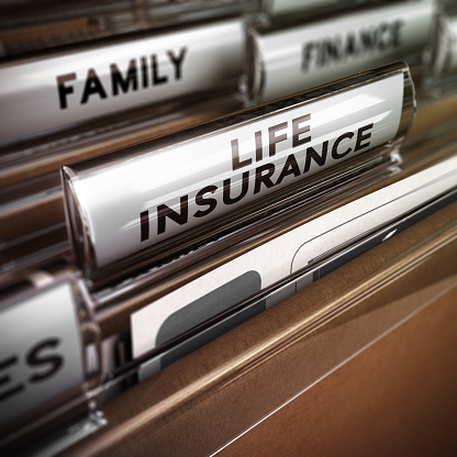 istockphoto-486000623-170667a Close up on a file tab with the word life insurance, focus on the main text and blur effect. Concept image for illustration of family protection policy